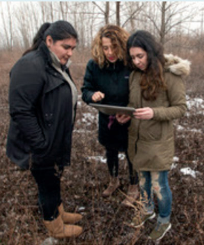 Professor Laurel Berman (center) with students mapping vacant properties near Englewood