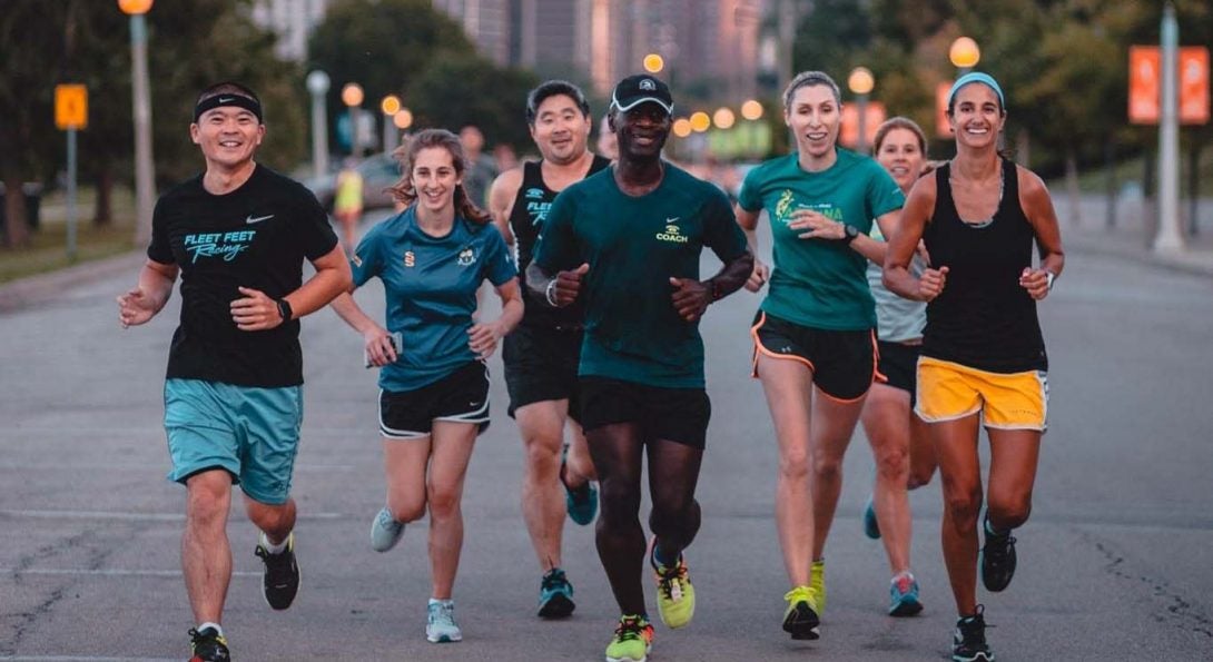 UIC alumnus and architect Kerl LaJeune (center) leading a group of runners