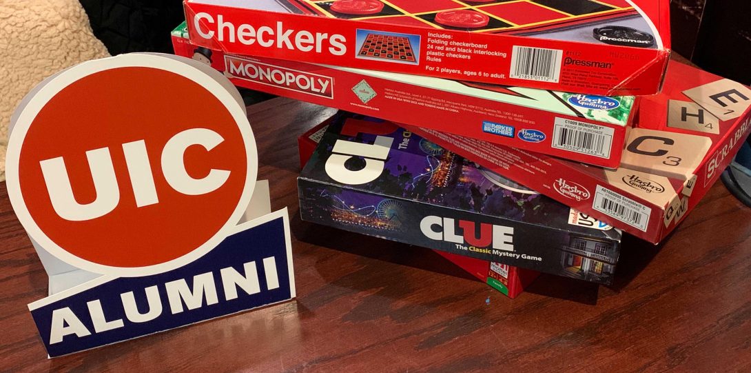 A stack of board games at the UIC Alumni Association Alumni and Student Social in Des Plaines