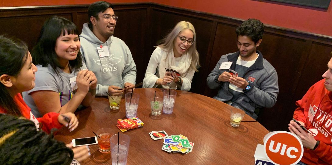 Guests playing games at UIC's Alumni and Student Social in Des Plaines