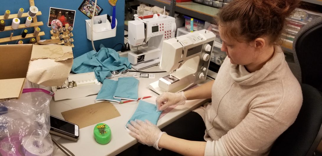 Artist sews face mask for healthcare workers