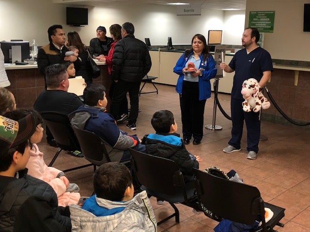 dentist giving a talk to patients