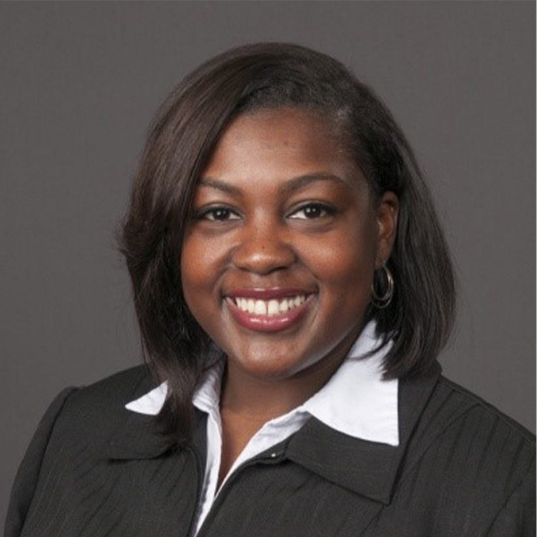 Woman smiling for a headshot