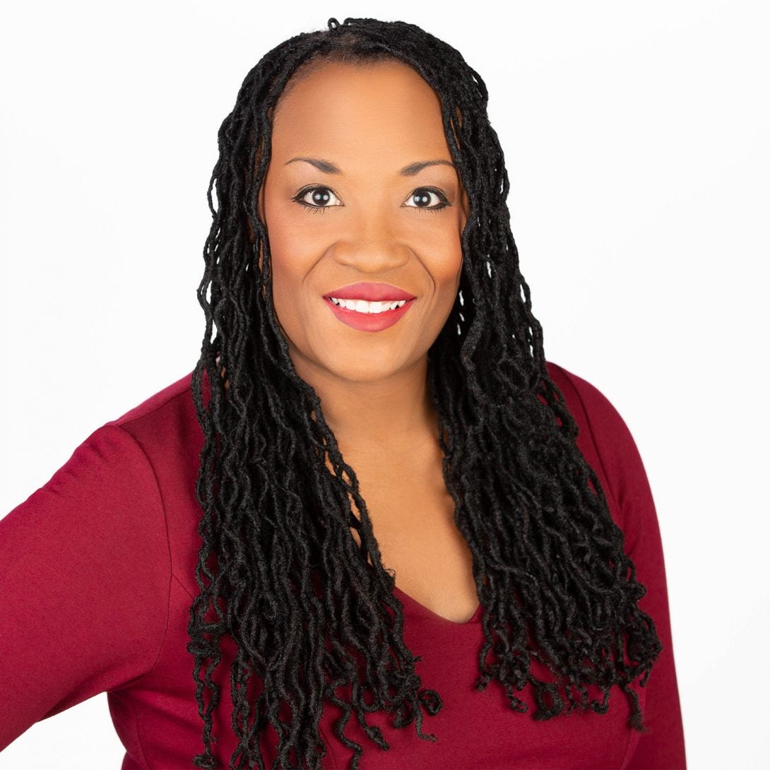 Woman smiling for a headshot