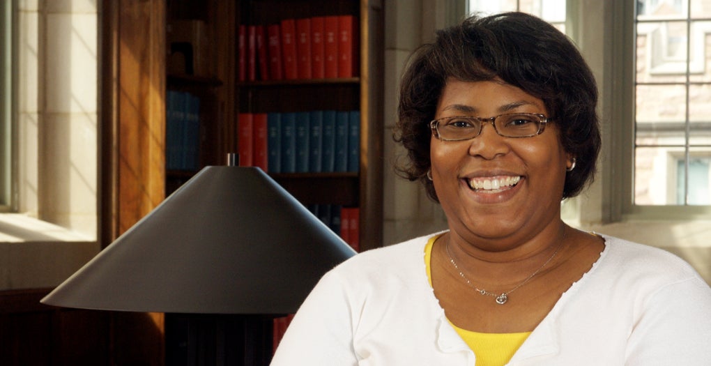 A woman smiling for a picture