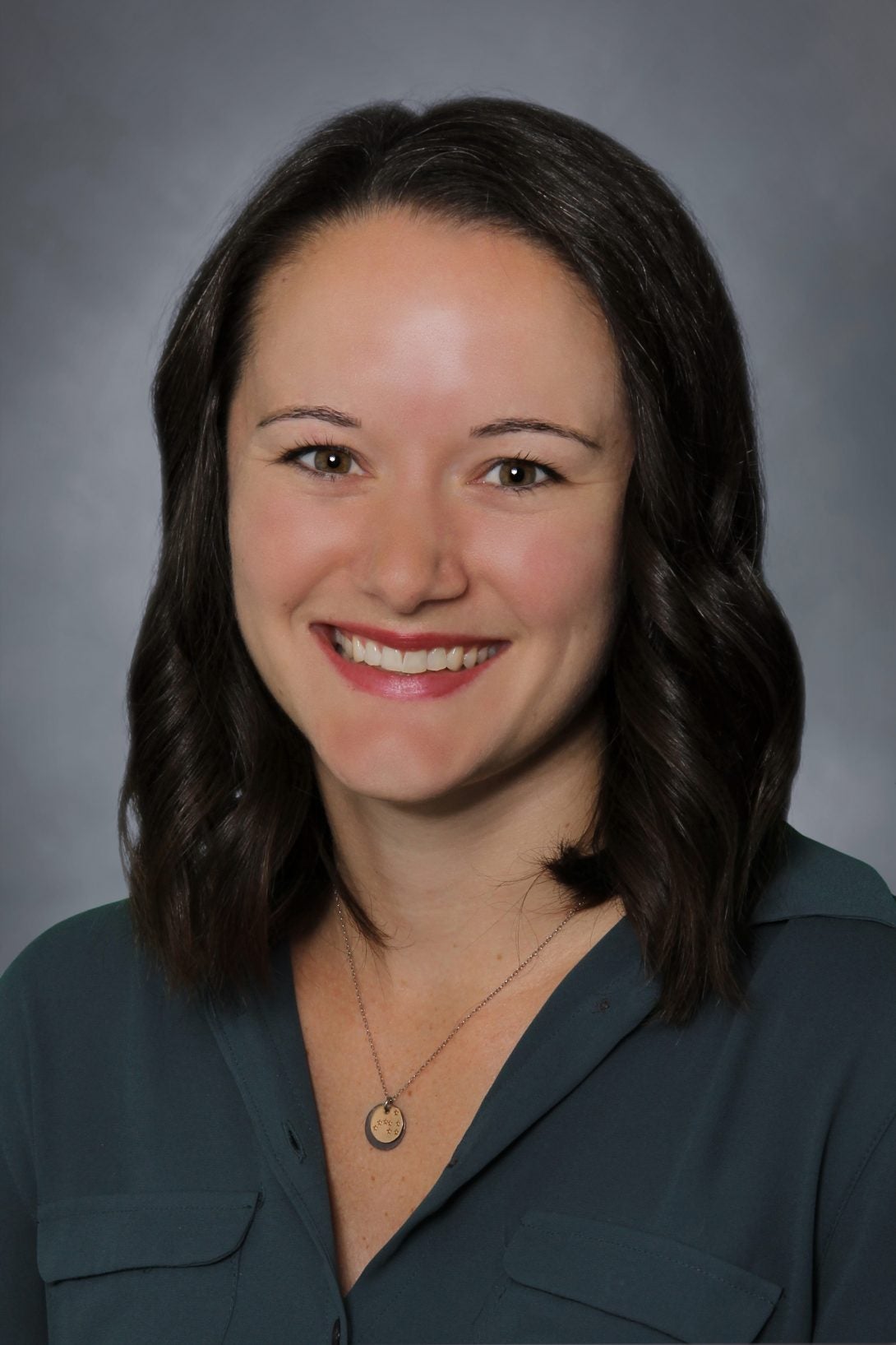 Woman smiling for a headshot