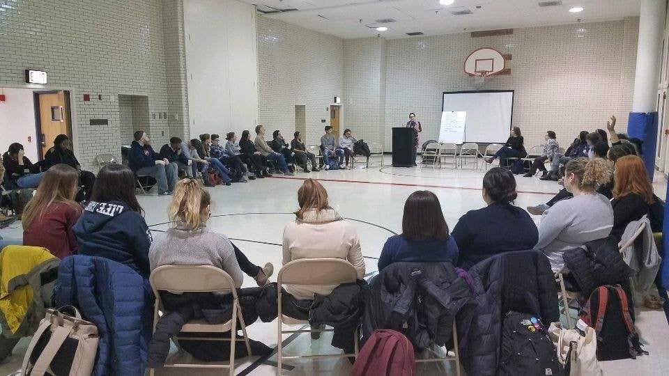 Community members take part in a discussion on healthcare disparities.