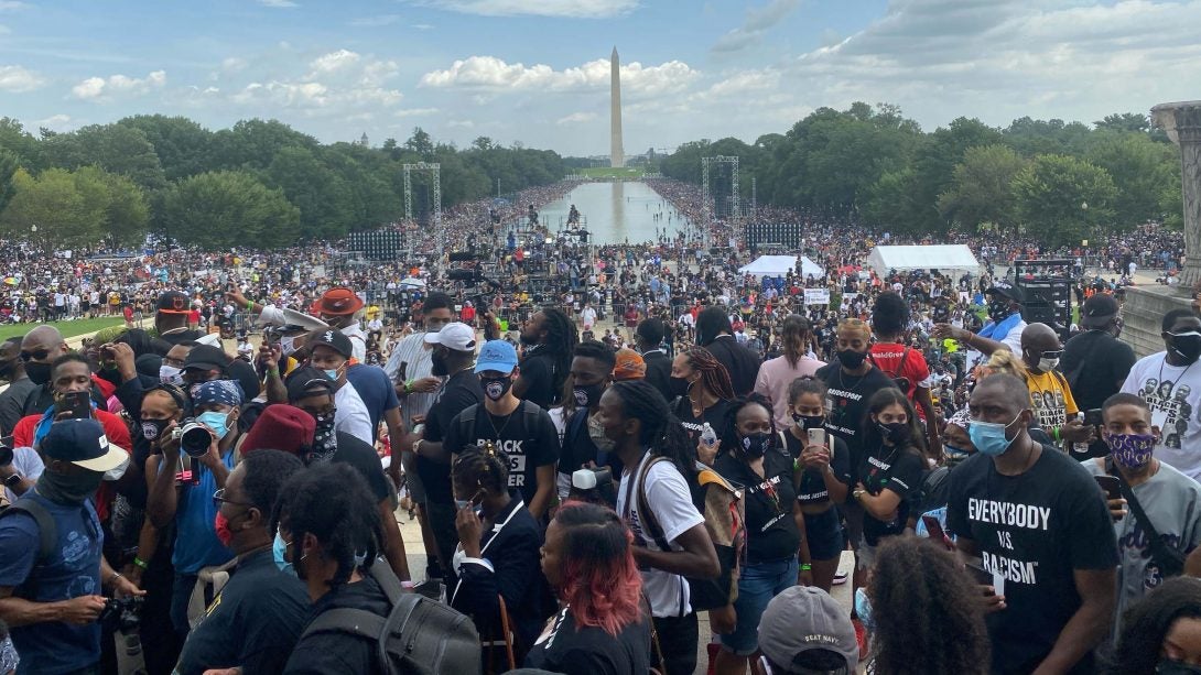 a large crowd of people at Washington Monument