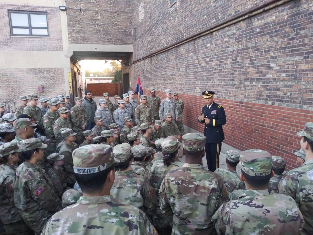 Major General William Walker talking to officers