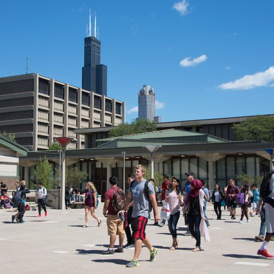 uic students walking on campus