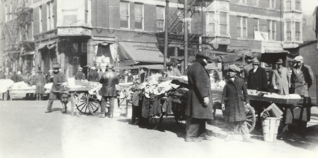 Maxwell Street market scene with goods for sale in handbarrow carts