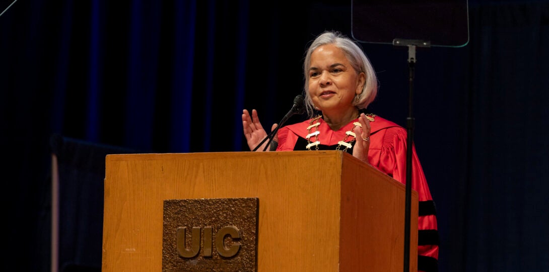 UIC Chancellor Marie Lynn Miranda addressing Golden Grads.