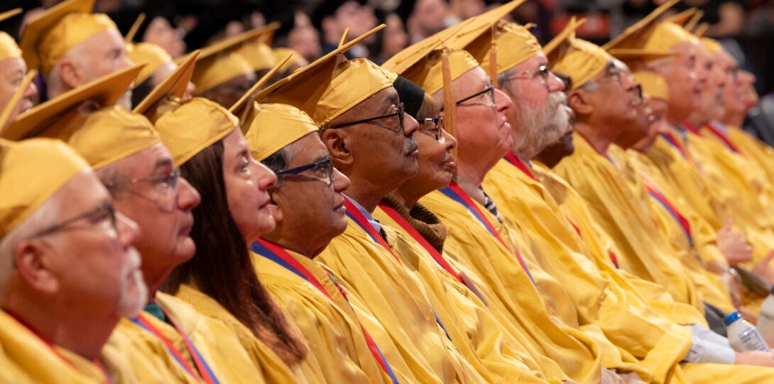 Group shot of Golden Grads in regalia.